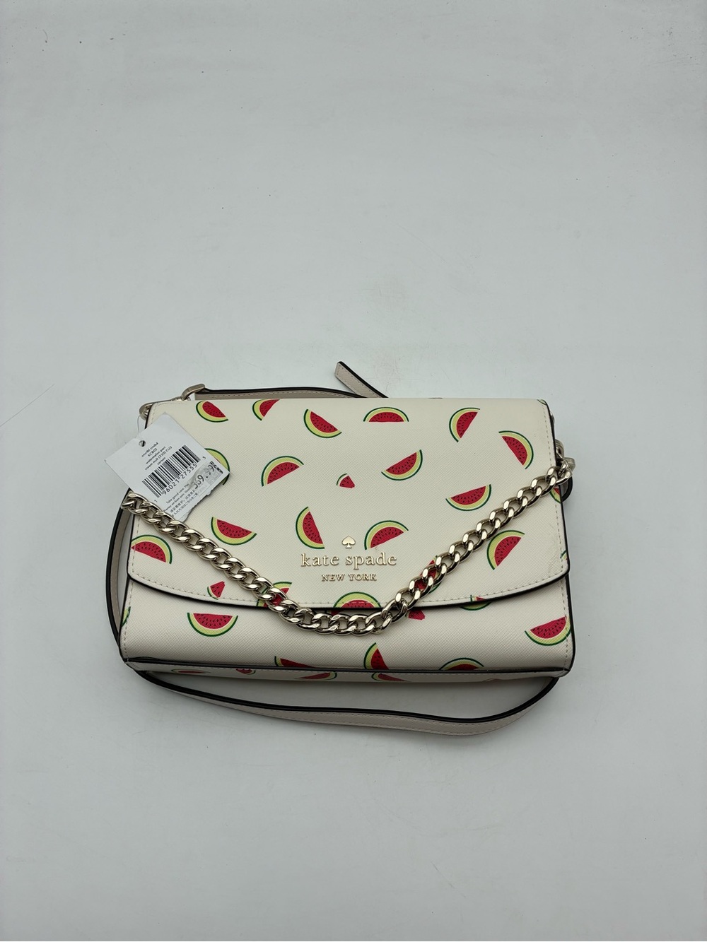 kate spade cream crossbody with watermelon print and gold chain